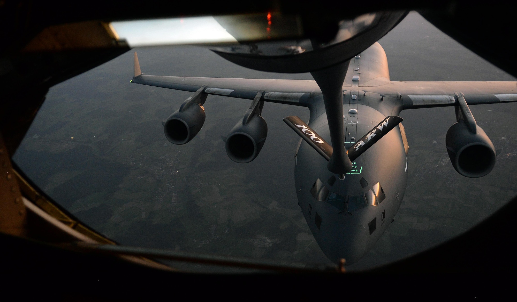 A C-17 Globemaster III flies behind a U.S. Air Force KC-135 during an aerial-refueling training exercise over Germany, Oct. 19, 2017. The C-17 operates out of Papa Air Base, Hungary, by the Heavy Airlift Wing which is made up of personnel from 12 countries. (U.S. Air Force photo by Airman 1st Class Luke Milano)