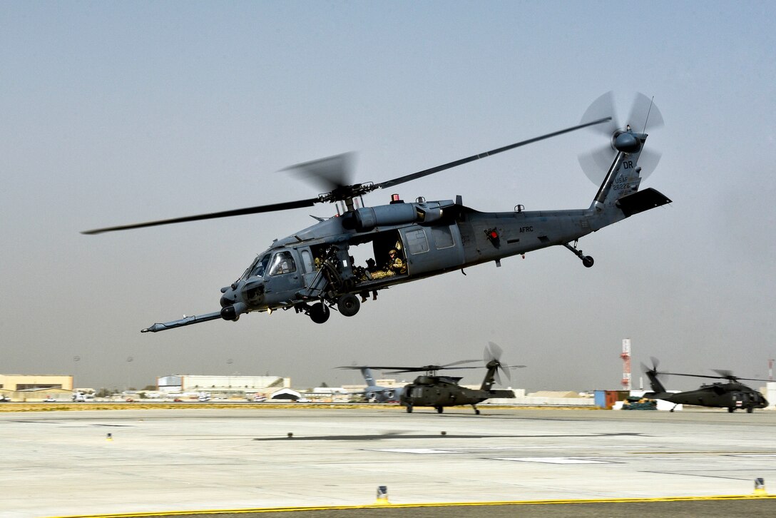 An Air Force HH-60 Pave Hawk helicopter takes off.