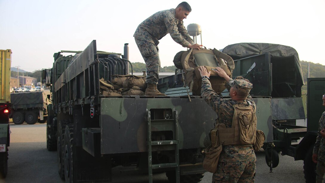 Marines with Marine Air Support Squadron 2, Marine Air Control Group 18, Marine Aircraft Group 36, 1st Marine Aircraft Wing, offload gear