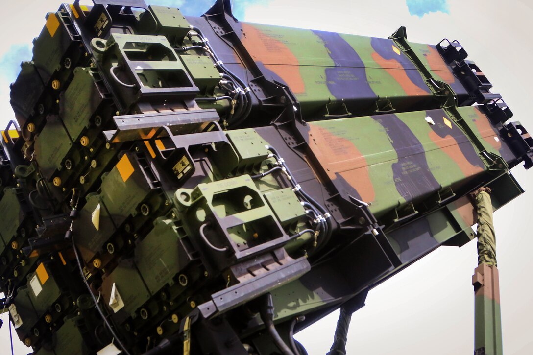 Soldiers prepare a Patriot missile launcher system during a table gunnery training exercise.