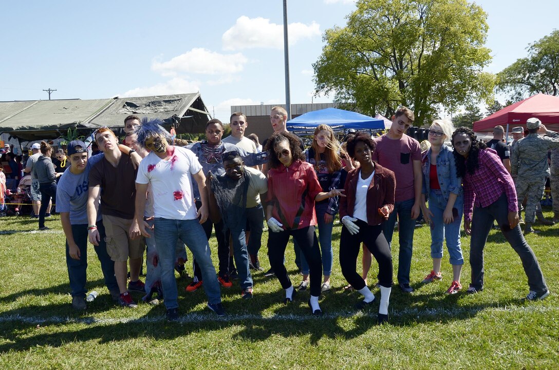 Members of the 445th Force Support Squadron pose for a picture during the Sept. 9, 2017 445th Family Fun Day. The Squadron’s theme for the event was Michael Jackson’s ‘Thriller’ and zombies. (U.S. Air Force photo/Staff Sgt. Joel McCullough)