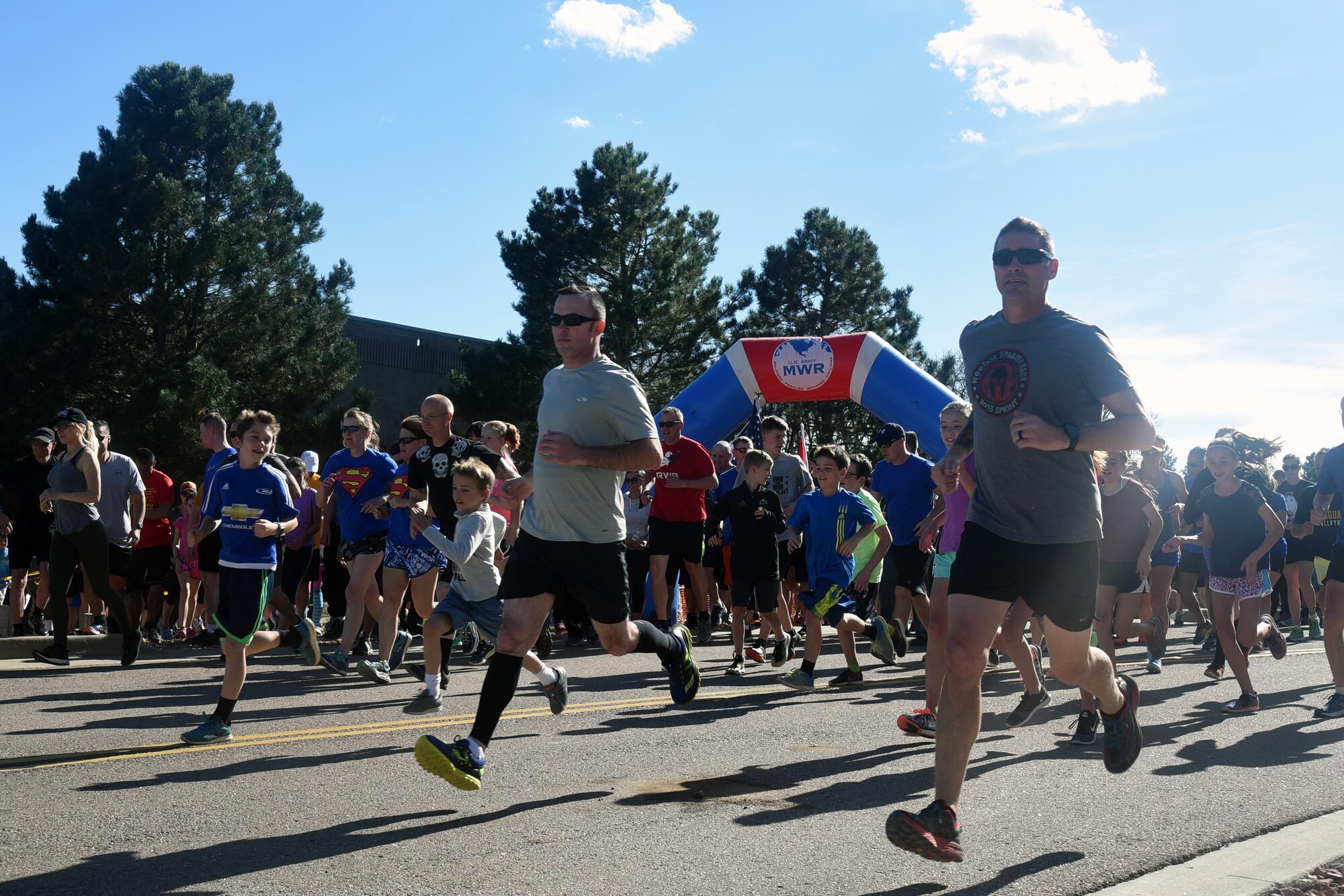 Participants embark at the start of the Zombie Tunnel 5k Fun Run at Cheyenne Mountain Air Force Station, Colorado, Oct. 20, 2017. The run wound around Cheyenne Mountain, with zombies awaiting runners along the way. (U.S. Air Force photo by Airman 1st Class William Tracy)