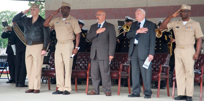 IMAGE: DAHLGREN, Va. (Oct. 16, 2017) – The Aegis Training and Readiness Center Ceremonial Color Guard marches in front of military and civilian personnel gathered with visitors to commemorate the centennial of the Navy base at Dahlgren with a kickoff ceremony. Over the next 12 months, personnel at the base and its tenant commands will join the community to engage in activities such as a science, technology, engineering and mathematics event, a time capsule ceremony, triathlon, spring picnic, concert lunch, historic movie premier, rocket contest, and a grand finale – all in celebration of the centennial.