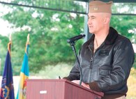 IMAGE: DAHLGREN, Va. (Oct. 16, 2017) – Naval Support Activity South Potomac Commanding Officer Capt. Michael O’Leary speaks to the military and civilian audience gathered to celebrate the centennial of the Navy base at Dahlgren. “Dahlgren is all of us and so much more,” he said. “I challenge each of you to learn more about our collective history in this coming year.  I’m excited to celebrate with you and I can’t tell you how proud I am to call you all shipmates at this truly magical place called Dahlgren.”