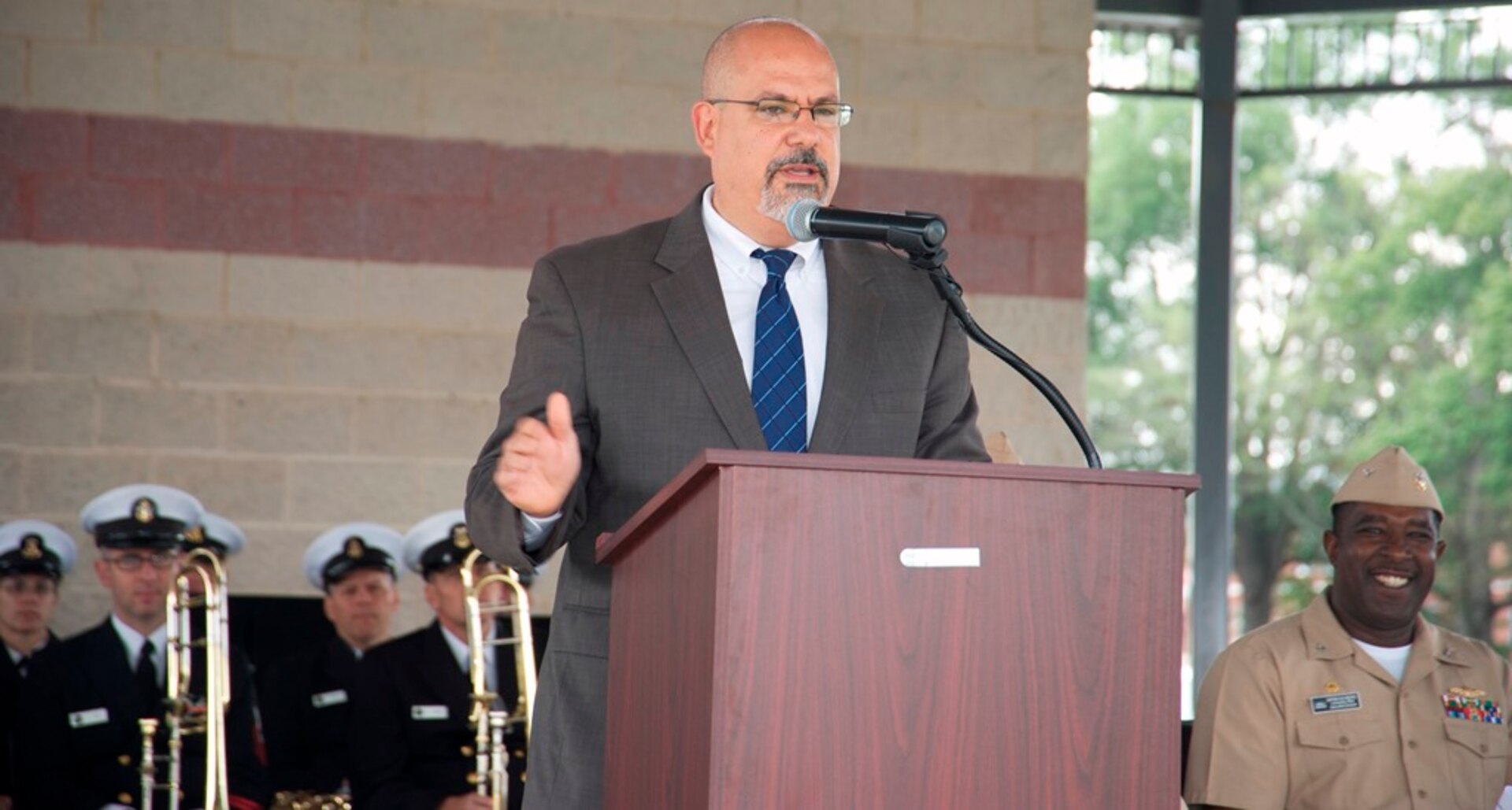 IMAGE: DAHLGREN, Va. (Oct. 16, 2017) – Naval Surface Warfare Center Dahlgren Division Technical Director John Fiore reviews the century of innovation at Dahlgren before the military and civilian audience gathered to celebrate the Navy base’s centennial. “Today we kick off the Dahlgren Centennial countdown,” said Fiore.  “It has the potential to fill us with wonderment. What will be the groundbreaking new innovations of the Navy's future and who will be there to make that happen? I look forward to the events that are scheduled throughout this year in celebrating our centennial but even more important than what we’ve done in the past is where we’re going to go in the future and the contributions we will make to the Navy moving forward.”