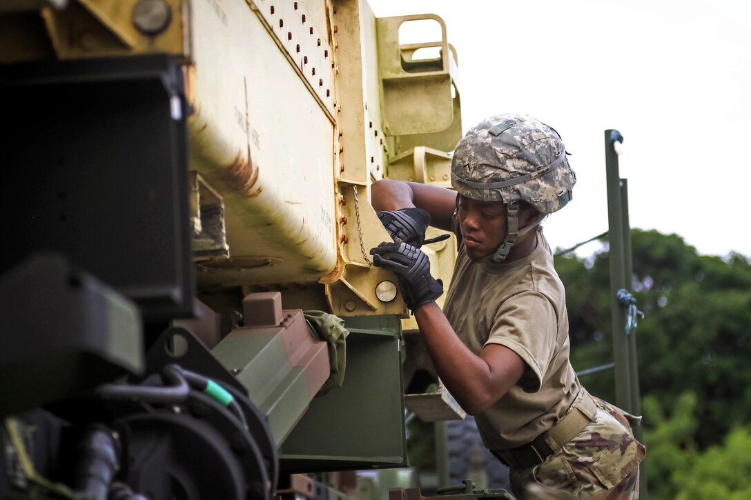 A soldier conducts a safety check on a Patriot missile system equipment during a table gunnery training exercise.