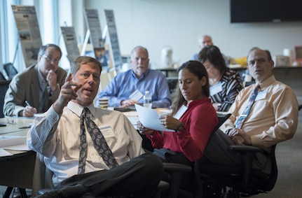 Rick Rhodes (front) from the Office of the Chief of Naval Operations (OPNAV) Air Warfare (N98), participates in the Deputy Assistant Secretary of the Navy for Unmanned Systems (DASN(UxS)) Facilities Roadmap workshop Sept. 19, 2017, at Naval Surface Warfare Center, Carderock Division in West Bethesda, Maryland. (U.S. Navy photo by Monica McCoy/Released)