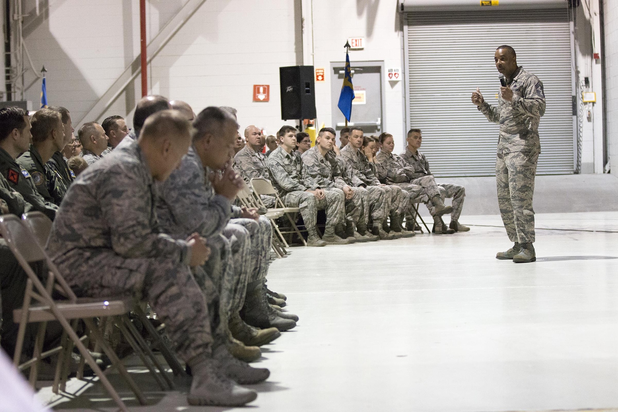 Chief Master Sgt. Timothy White, 4th Air Force command chief, speaks to 445th Airlift Wing Airmen during an all call Sept. 9, 2017.