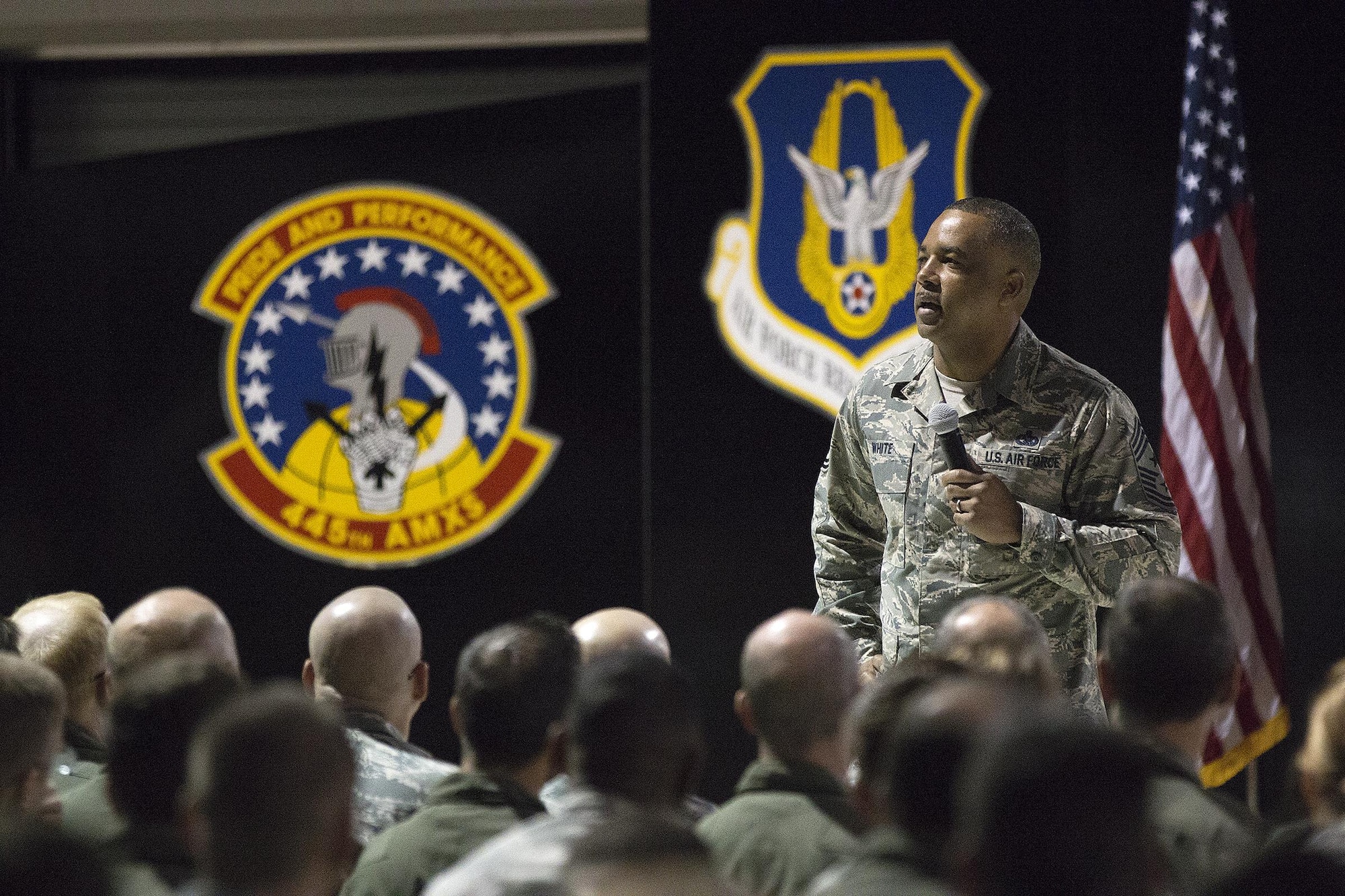 Chief Master Sgt. Timothy White, 4th Air Force command chief, speaks to 445th Airlift Wing Airmen during an all call Sept. 9, 2017.