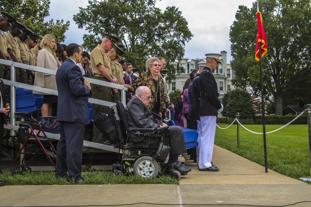 Service members and guests bow their heads as the invocation is given during a Beirut Memorial Parade at Marine Barracks Washington D.C., Oct. 23, 2017. The ceremony was conducted to honor the 34th anniversary of the attack on the U.S. and French Barracks in Beirut and remember the fallen service members, survivors and their families. (Official Marine Corps photo by Lance Cpl. Damon Mclean/Released)
