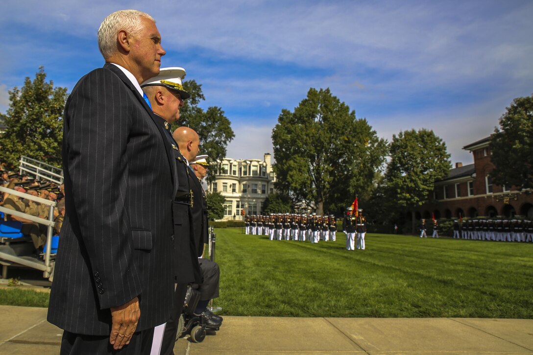 Members of the official party of a Beirut Memorial Parade stand while pass and review is conducted during a Beirut Memorial Parade at Marine Barracks Washington D.C., Oct. 23, 2017. The ceremony was conducted to honor the 34th anniversary of the attack on the U.S. and French Barracks in Beirut and remember the fallen service members, survivors and their families. (Official Marine Corps photo by Lance Cpl. Damon Mclean/Released)
