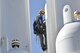 In an effort to save money and have less facility down-time, a new technique was used at the AEDC Aerodynamic and Propulsion Test Unit (APTU) at Arnold Air Force Base to inspect high pressure air storage vessels. As part of the inspection, an outside contractor was hired and members of its rope crew set sensors on the bottles at APTU to detect flaws. (U.S. Air Force photo/Rick Goodfriend)