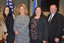 Air Force Life Cycle Management Center graduates of the PALACE Acquire Program, from left are, Athena Kernes, permanently assigned to the Legacy Tanker Division, KC-135 Program Office, and Shauna Henderson, permanently assigned to the Propulsion Sustainment Directorate, F117 Engine Program Office. Tracy Solis, graduated the developmental trainee program and is located in Propulsion Sustainment Directorate, Operations Management. Craig Pollock, Tinker branch chief, presented the graduation certificates.