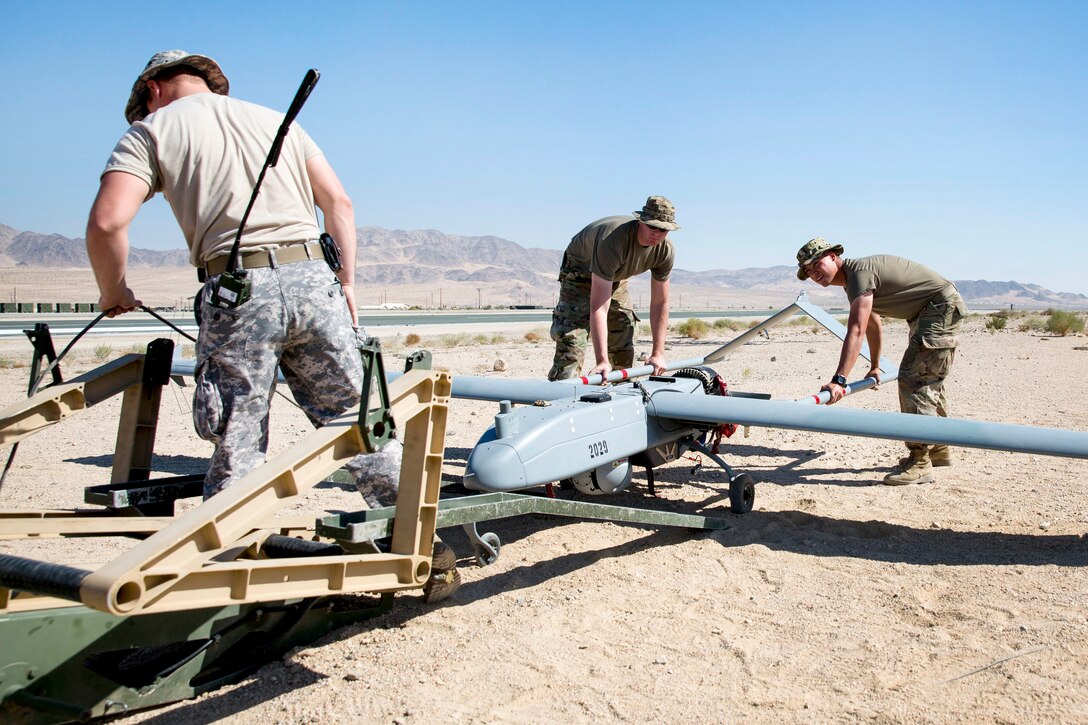 Soldiers prepare an RQ-7B Shadow for launch during Integrated Training Exercise 1-18.