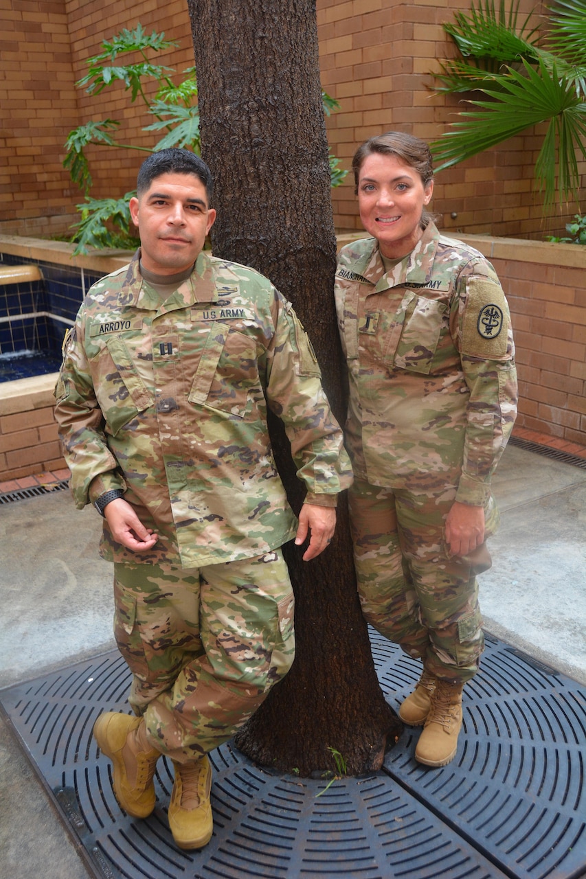 Army Capt. John Arroyo and Army 1st Lt. Katie Ann Blanchard pose outside Brooke Army Medical Center on Joint Base San Antonio-Fort Sam Houston, Texas.
