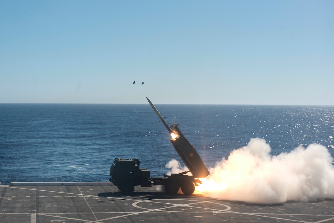 High Mobility Artillery Rocket System (HIMARS) is fired from the flight deck of the San Antonio-class amphibious transport dock ship USS Anchorage