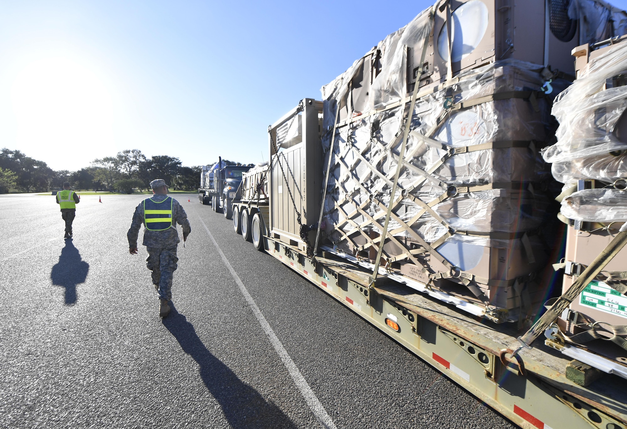 Cargo is inspected as it arrives at an initial staging area here Oct. 20 as part of sustained efforts aiding the rebuilding of Puerto Rico in the wake of Hurricane Maria.