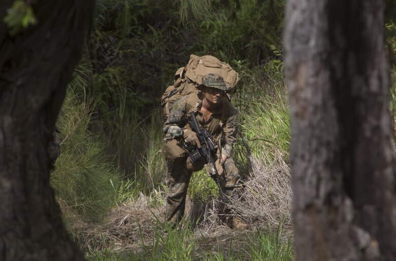 Sgt. Zachary Malik, a student of Recon Team Leaders Course (RTLC), takes part in a jungle patrol, East Range, Schofield Barracks, Oct. 18, 2017. RTLC is an 8-week advanced joint-service course that takes place in three key geographical regions of operation such as classes at Camp Pendleton, California, desert patrol operations in Yuma, Arizona, and ending with jungle and amphibious exercises across Oahu, Hawaii. (U.S. Marine Corps photo by Lance Cpl. Luke Kuennen)