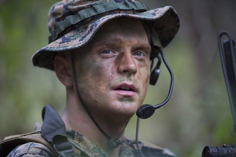 Cpl. Jonathan Schmalhausen, a student of the Recon Team Leaders Course (RTLC), takes part in a jungle patrol, East Range, Schofield Barracks, Oct. 18, 2017. RTLC is an 8-week advanced joint-service course that takes place in three key geographical regions of operation such as classes at Camp Pendleton, California, desert patrol operations in Yuma, Arizona, and ending with jungle and amphibious exercises across Oahu, Hawaii. (U.S. Marine Corps photo by Lance Cpl. Luke Kuennen)