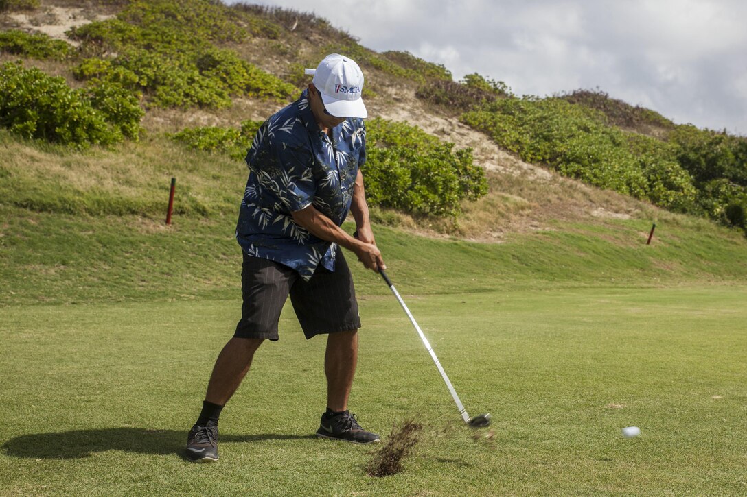 A student with the Warriors Golf Clinic, hosted by the Salute Military Golf Association (SMGA), practices his golf swings at the Kaneohe Klipper’s Golf Course, Marine Corps Base Hawaii, Oct. 21, 2017. The SMGA is a non-profit organization that serves Post 9/11 wounded veterans by introducing the sport of golf as a diversion for rehabilitation through Warrior Golf Clinics. (U.S. Marine Corps photo by Cpl. Jesus Sepulveda Torres)