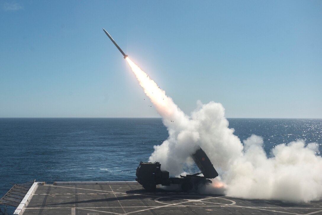 The High Mobility Artillery Rocket System (HIMARS) is fired from the flight deck of the amphibious transport dock ship USS Anchorage (LPD 23) during Dawn Blitz 2017 over the Pacific Ocean, Oct. 22, 2017. Dawn Blitz is a scenario-driven exercise designed to train and integrate Navy and Marine Corps units by providing a robust training environment where forces plan and execute an amphibious assault, engage in live-fire events, and establish expeditionary advanced bases in a land and maritime threat environment to improve naval amphibious core competencies. (U.S. Navy photo by Mass Communication Specialist 2nd Class Matthew Dickinson)