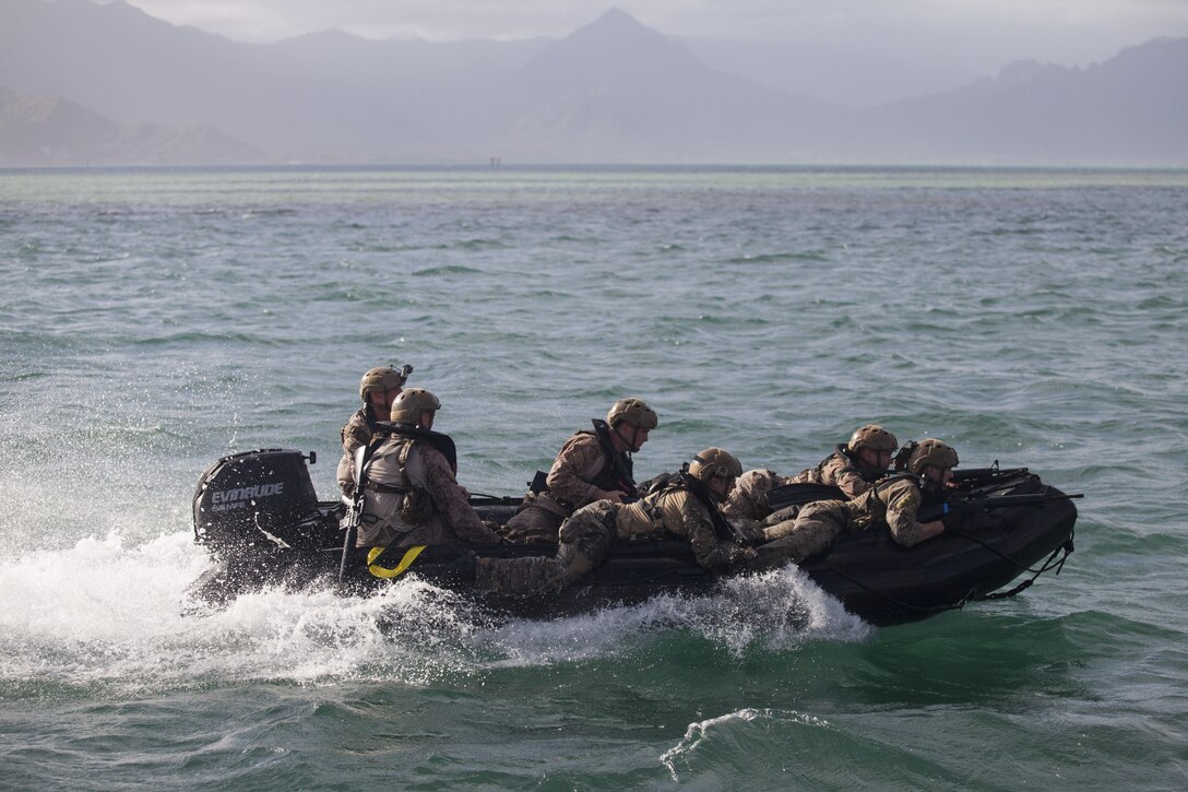 U.S. Service members with the Reconnaissance Team Leader Course (RTLC) conduct amphibious water training during a helocast exercise, Marine Corps Base Hawaii, Oct. 19, 2017. RTLC is an 8-week advanced joint-service course that takes place in three key geographical regions of operation such as classes at Camp Pendleton, California, desert patrol operations in Yuma, Arizona, and ending with jungle and amphibious exercises across Oahu, Hawaii. (U.S. Marine Corps photo by Cpl. Jesus Sepulveda Torres)