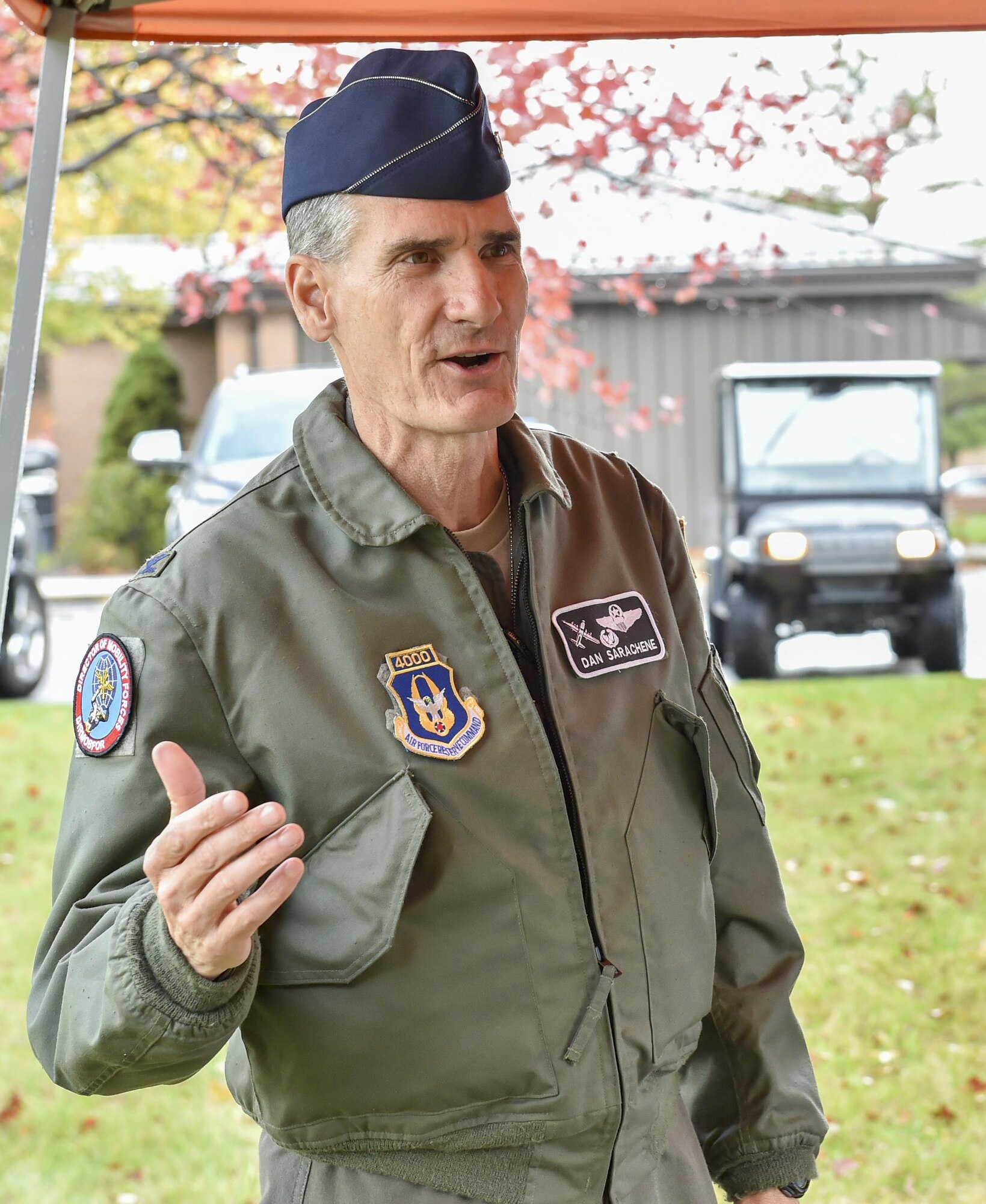 Col. Dan Sarachene, 910th Airlift Wing commander, gives remarks during a tree-planting ceremony here, Oct. 24