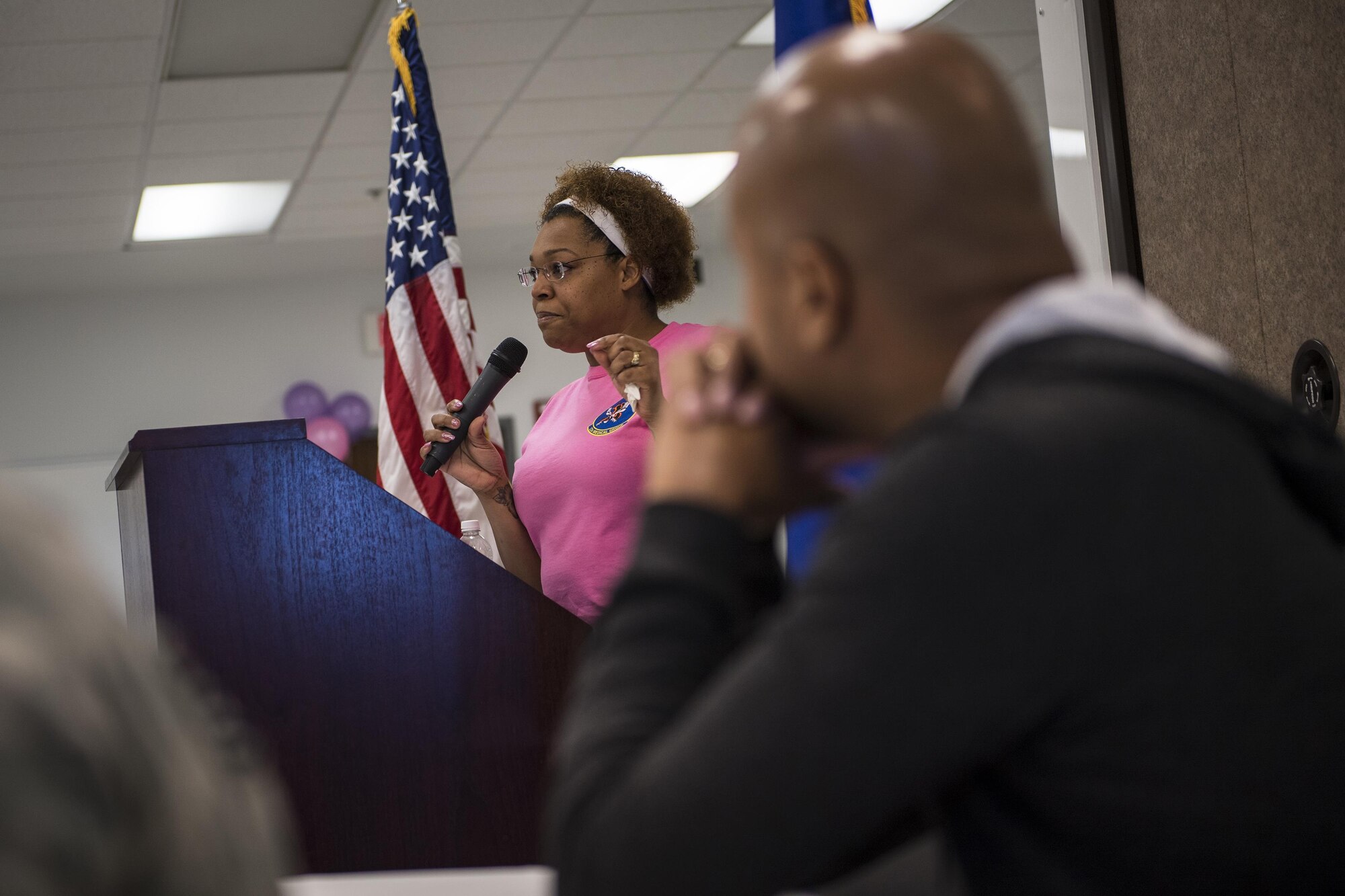 Ret. U.S. Air Force Master Sgt. Latonia Knight, 23d Medical Group program analyst, shares her breast cancer survival story during a Pink and Purple Luncheon, Oct. 19, 2017, at Moody Air Force Base, Ga. Survivors spoke at the event in an effort to raise awareness and encourage women to get checked. (U.S. Air Force photo by Senior Airman Janiqua P. Robinson)