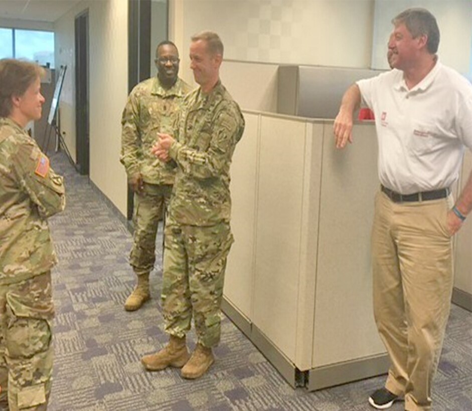Duane “Bubba” Poiroux, the chief of Mobile District’s Coastal Project Office (right) speaks with South Atlantic Division commander, Brig. Gen. Diana Holland (left); South Atlantic Division’s senior enlisted advisor, Command Sgt. Maj. Douglas Padgett (center); and the Puerto Rico Recovery Field Office commander, Col. James DeLapp, in San Juan, Puerto Rico.