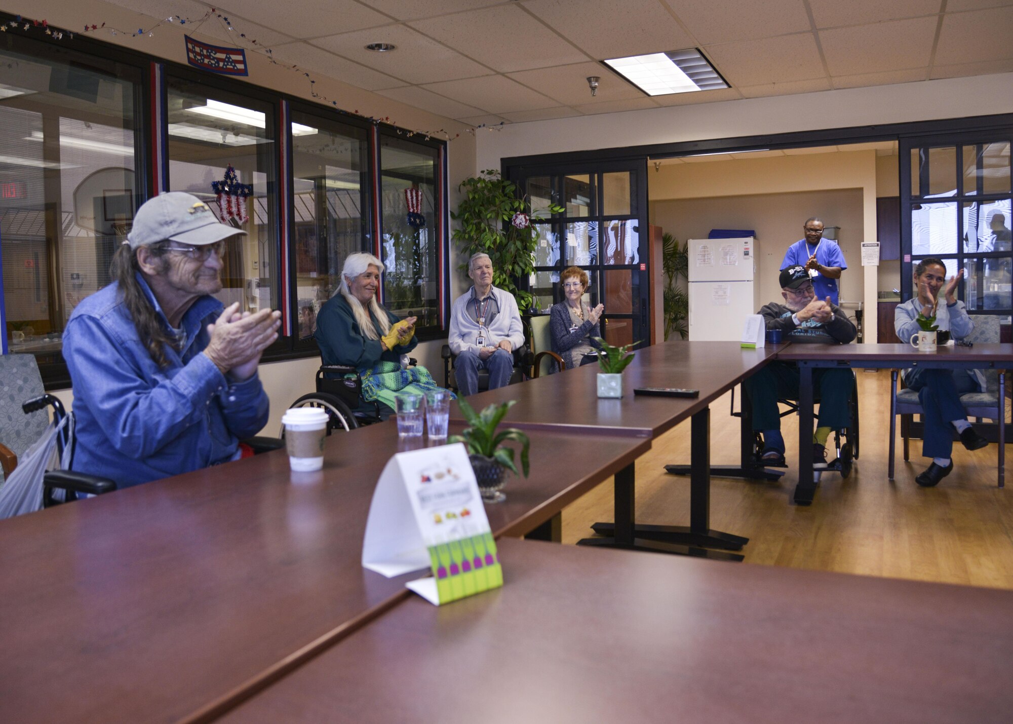 Veterans cheer for the Air Force Academy’s Clarinet Quartet, at the Raymond G. Murphy Veterans Affairs Medical Center, N.M., Oct. 21, 2017.  The quartet visited to play a few songs for the veterans as well as participate in fellowship. (U.S. Air Force photo by Airman 1st Class Lexi Crawford)