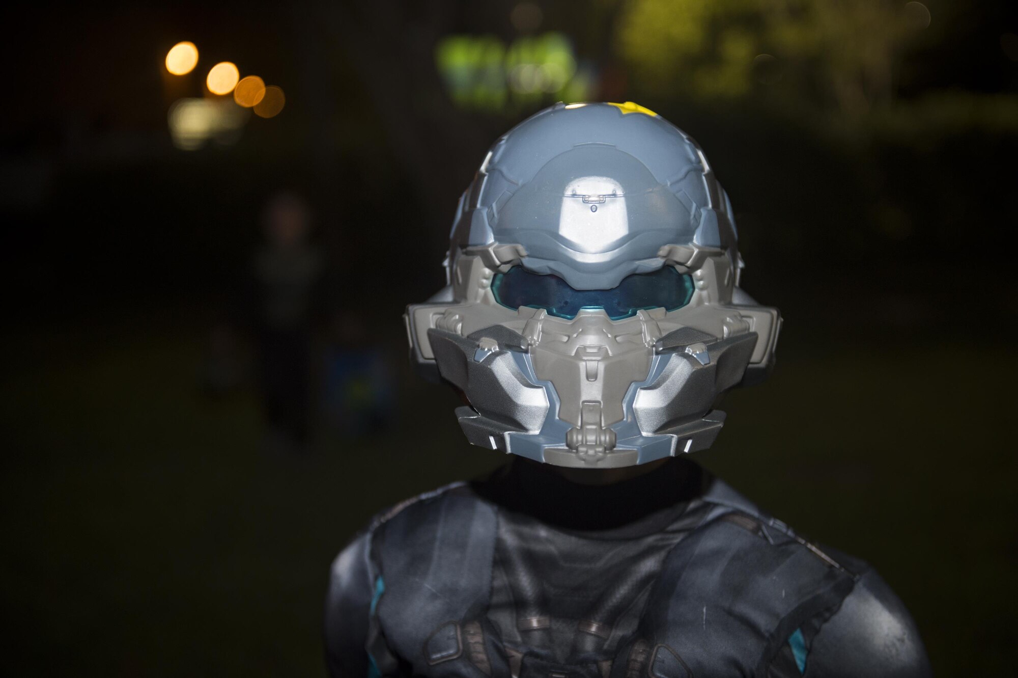 A child dressed in a costume poses for a photo during the Trunk or Treat event Oct. 20, 2017, at Moody Air Force Base, Ga. More than 3,500 Airmen and their families participated in the annual Trunk or Treat event hosted by the 23d Force Support Squadron Youth Programs. (U.S. Air Force photo by Andrea Jenkins)