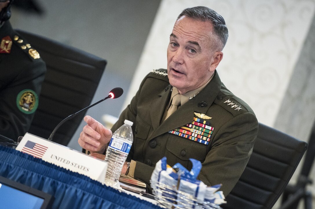 The chairman of the Joint Chiefs of Staff speaks at a conference.