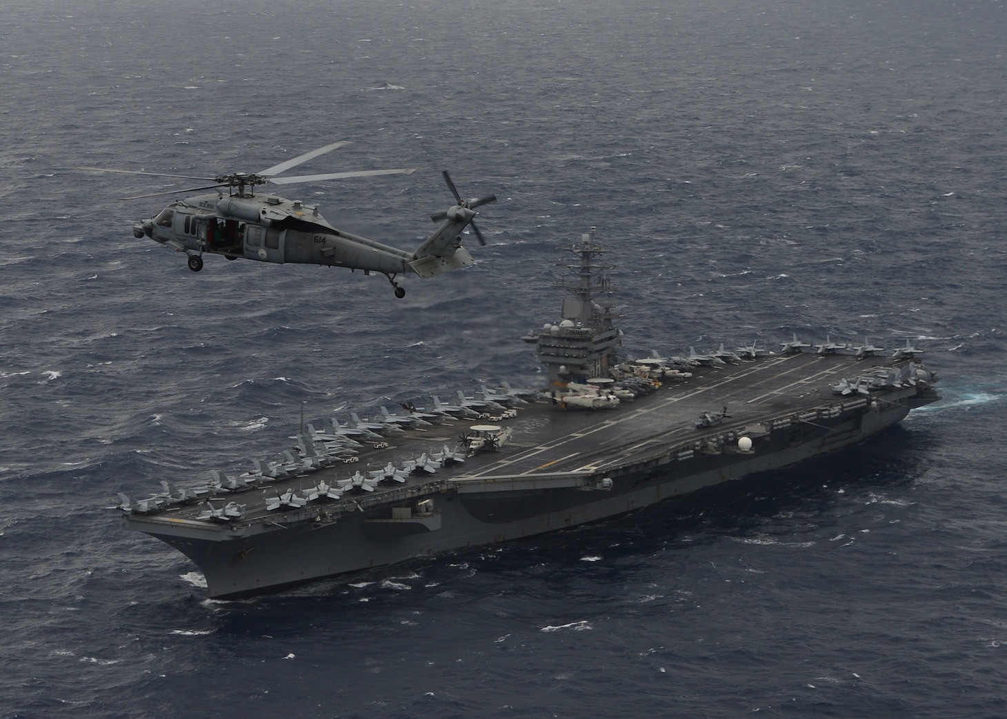 File photo: BAY OF BENGAL (July 17, 2017) An MH-60S Sea Hawk Helicopter from the "Eightballers" of Helicopter Sea Combat Squadron (HSC) 8 hovers above the aircraft carrier USS Nimitz (CVN 68) during a photo exercise with the Indian Navy and Japan Maritime Self-Defense Force, July 17, 2017, in the Bay of Bengal as part of Exercise Malabar 2017.