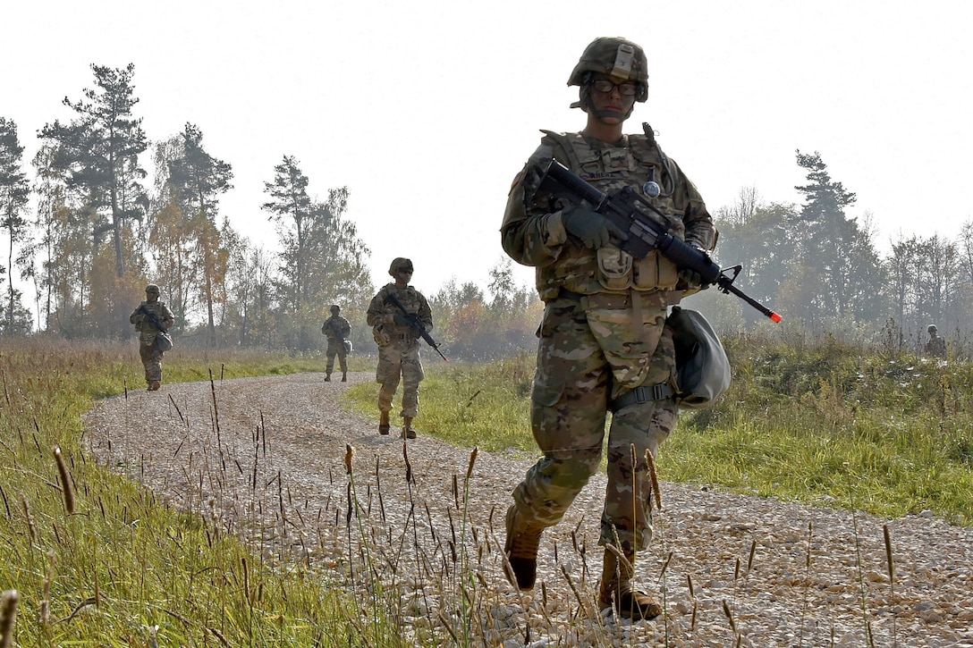 Soldiers conduct a foot patrol during urban operations training.