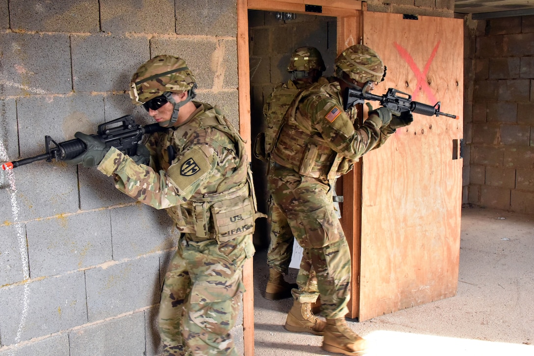 Soldiers clear a room during urban operations training.