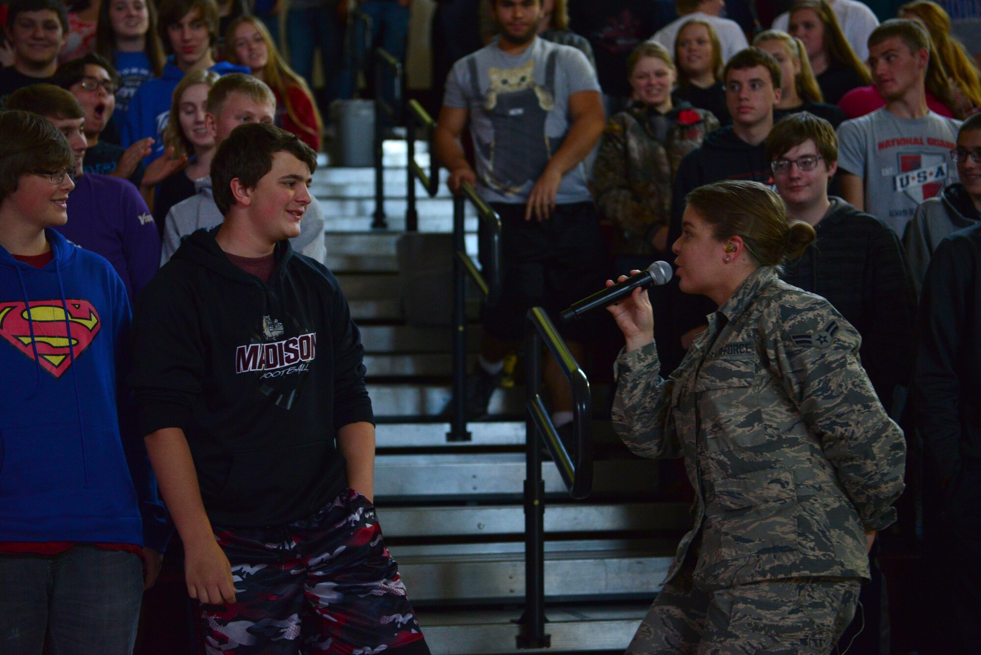 Airman 1st Class Aliyah Richling, a vocalist with the Heartland of America Band’s Raptor ensemble, sings to students at Madison High School in Madison, South Dakota, Oct. 10, 2017. The ensemble partnered with local recruiters to teach high school students about the Air Force mission on the tour.