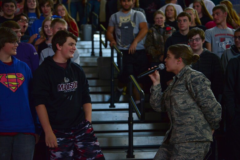 Airman 1st Class Aliyah Richling, a vocalist with the Heartland of America Band’s Raptor ensemble, sings to students at Madison High School in Madison, South Dakota, Oct. 10, 2017. The ensemble partnered with local recruiters to teach high school students about the Air Force mission on the tour.