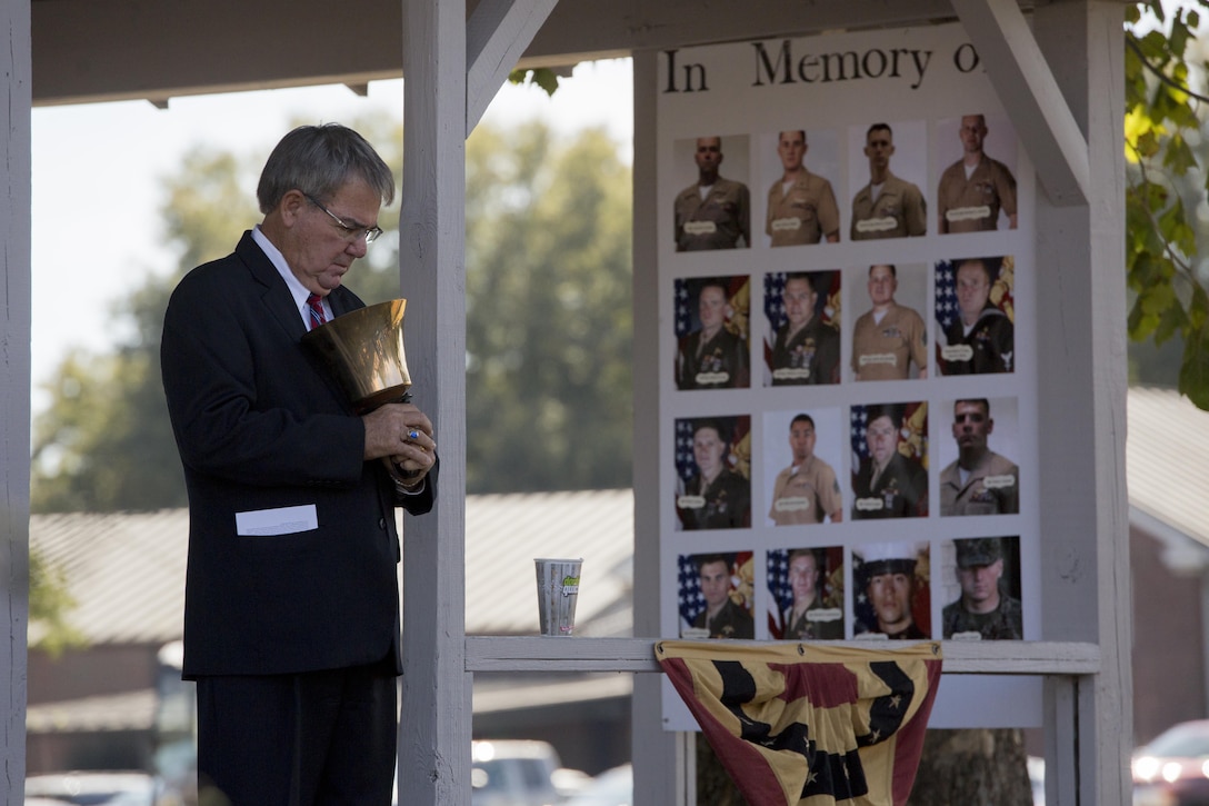 Doug Russell, a life-long resident of Moorhead, rings a bell during a final roll call of the 15 Marines and one sailor who died in a C-130 plane crash in July 2017, in Moorhead, Miss., Oct. 19, 2017. The event was held not only to memorialize and remember the fallen service members, but to also celebrate the 200th birthday of the state of Mississippi. (U.S. Marine Corps photo by Cpl. Dallas Johnson)