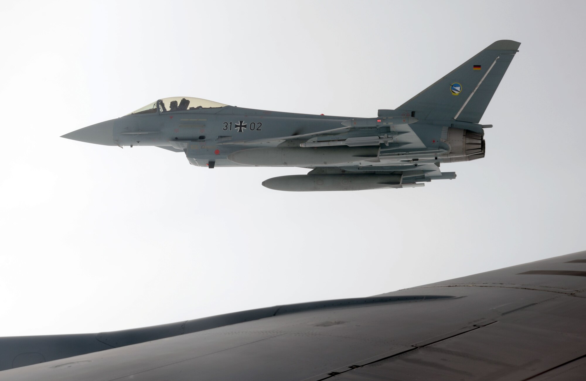 A German air force Tornado flies alongside a U.S. Air Force KC-135 from RAF Mildenhall, England, after receiving fuel Oct. 24, 2017, over Germany. The Tornado was one of four aircraft refueled during the mission. (U.S. Air Force photo by Airman 1st Class Benjamin Cooper)