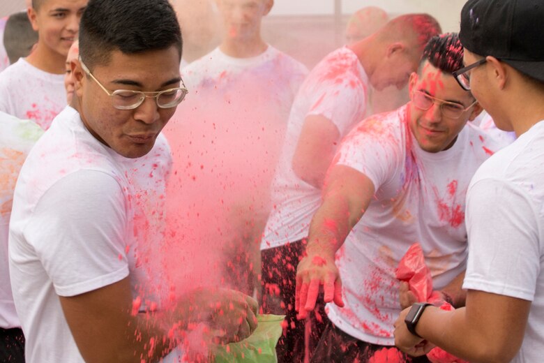 Competitors color up before the 5K Color Run at Little Rock Air Force Base, Ark., Oct. 20, 2017.