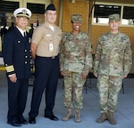 Naval Health Clinic Corpus Christi Commanding Officer Capt. Miguel A. Cubano (from left),  Seaman Daniel R. Frink, Brooke Army Medical Center Deputy Commanding Officer Col. Traci Crawford, and Enlisted Advisor Deputy Commander Inpatient Services Master Sgt. Richard Russell following the presentation of the Army’s 68W Utilization Program silver badge to Frink Oct. 18, 2017.  Frink, assigned to NHCCC San Antonio Detachment at Joint Base San Antonio-Fort Sam Houston, is the first Sailor in the program.