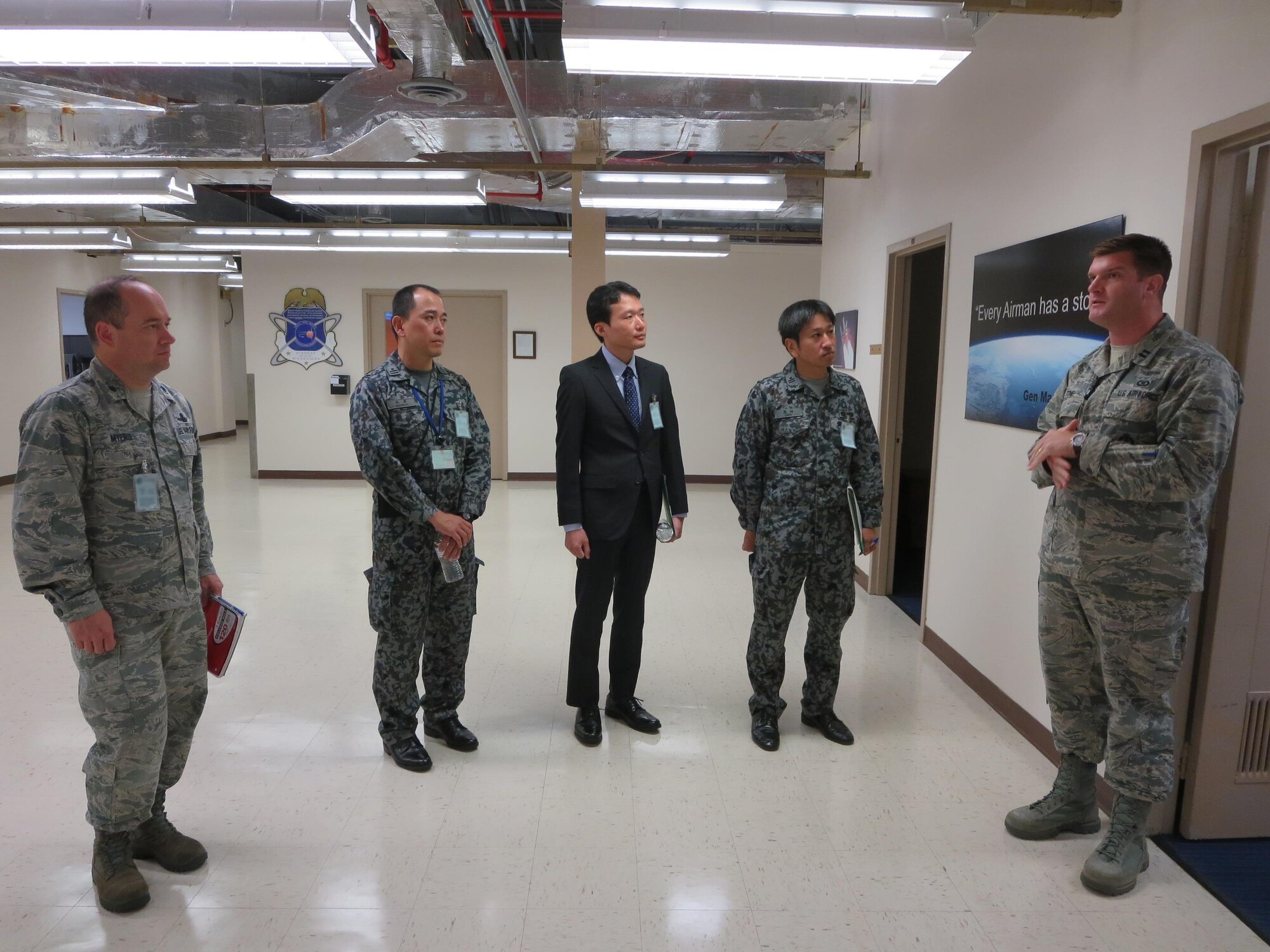 Three members of the Japanese Space Situational Awareness Policy office visit the 20th Space Control Squadron, Oct. 4, 2017, at Eglin Air Force Base, Florida. The three visitors including Lt. Col. Darrell Myers (left), Air Force branch chief for international engagement, were educated on the utilization of equipment and weapons systems used by the 20th SPCS. (Courtesy photo)