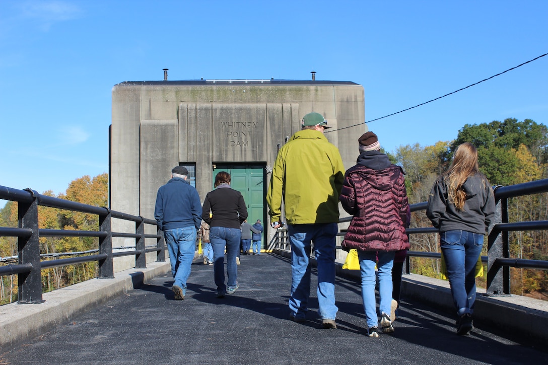 Members of the public make their way into Whitney Point Dam’s gatehouse during a rare opportunity to see the inside of the gatehouse as part of the celebration of Whitney Point Dam’s 75th anniversary Saturday October 21, 2017. The dam in Whitney Point, N.Y., is operated by the U.S. Army Corps of Engineers, Baltimore District and provides flood risk management to downstream communities and its reservoir is a popular recreational spot managed by Broome County Department of Parks and Recreation.