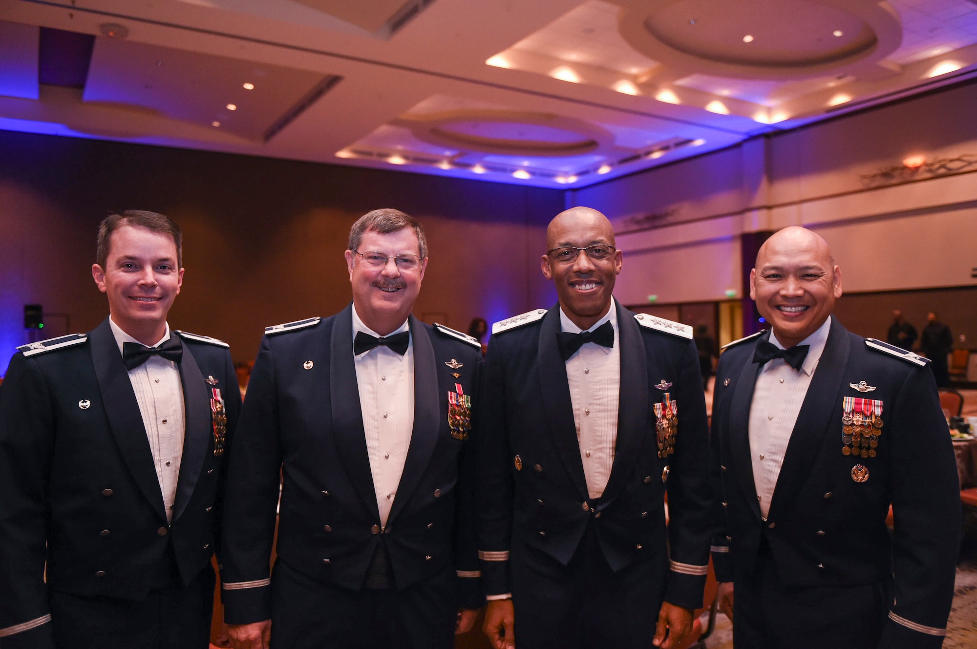 (From left to right) Col. Jeffrey Nelson, 628th Air Base Wing commander, Col. Gregory Gilmour, 315th Airlift Wing commander, Lt. Gen. Charles Brown, U.S. Central Command deputy commander and Col. Jimmy Canlas, 437th Airlift Wing commander, get together before the start of the Air Force Ball at the Charleston Area Convention Center in North Charleston, S.C., Oct. 21, 2017.