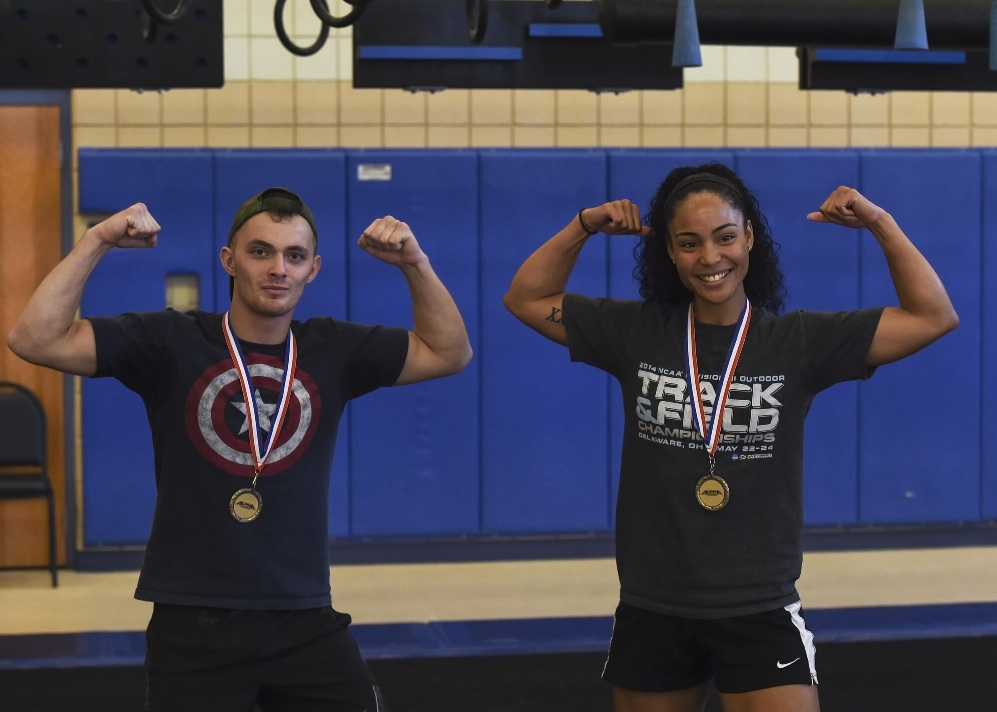 U.S. Air Force Airman 1st Class Trevor Puerile, 633rd Security Forces Squadron installation entry controller, and 2nd Lt. Nicole Mitchell, 83rd Network Operations Squadron directory services officer in charge, pose for a photo after earning the titles of Alpha Warrior Northeast regional champions at Joint Base Langley-Eustis, Va., Oct. 21, 2017.