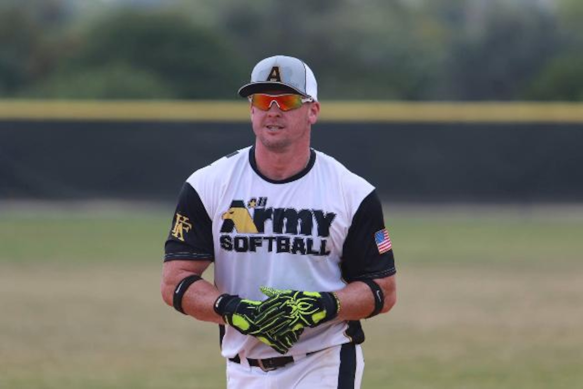 U.S. Army Sgt. 1st Class James Segrue, U.S. Army Training and Doctrine Command security NCO in charge, walks off the field between innings during the Armed Forces Softball Tournament at Fort Sam Houston, Texas, Sept. 18-22, 2017.