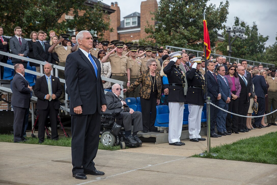 Vice President Mike Pence stands at attention as honors are rendered for him during a Beirut Memorial Parade at Marine Barracks Washington D.C., Oct. 23, 2017. The ceremony was conducted to honor the 34th anniversary of the attack on the U.S. and French Barracks in Beirut and remember the fallen service members, and survivors and their families. (Official Marine Corps photo by Cpl. Robert Knapp/Released)