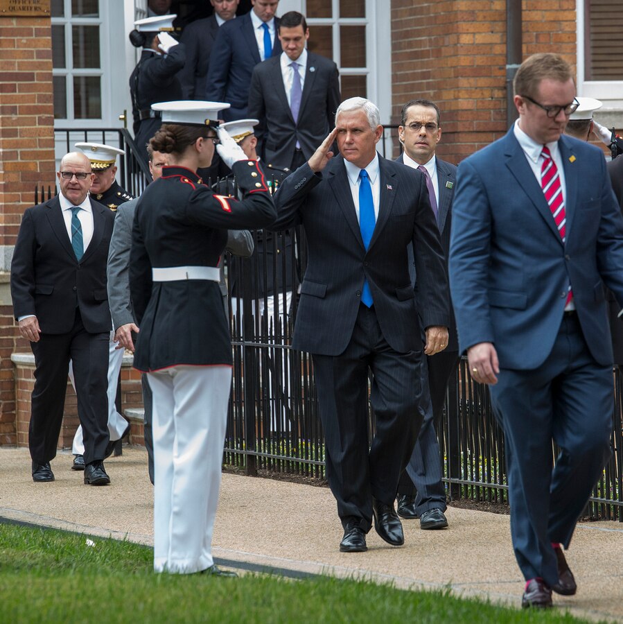 Vice President Mike Pence renders a salute as he is escorted to the parade deck before the commencement of a Beirut Memorial Parade at Marine Barracks Washington D.C., Oct. 23, 2017. The ceremony was conducted to honor the 34th anniversary of the attack on the U.S. and French Barracks in Beirut and remember the fallen service members, survivors and their families. (Official Marine Corps photo by Cpl. Robert Knapp/Released)