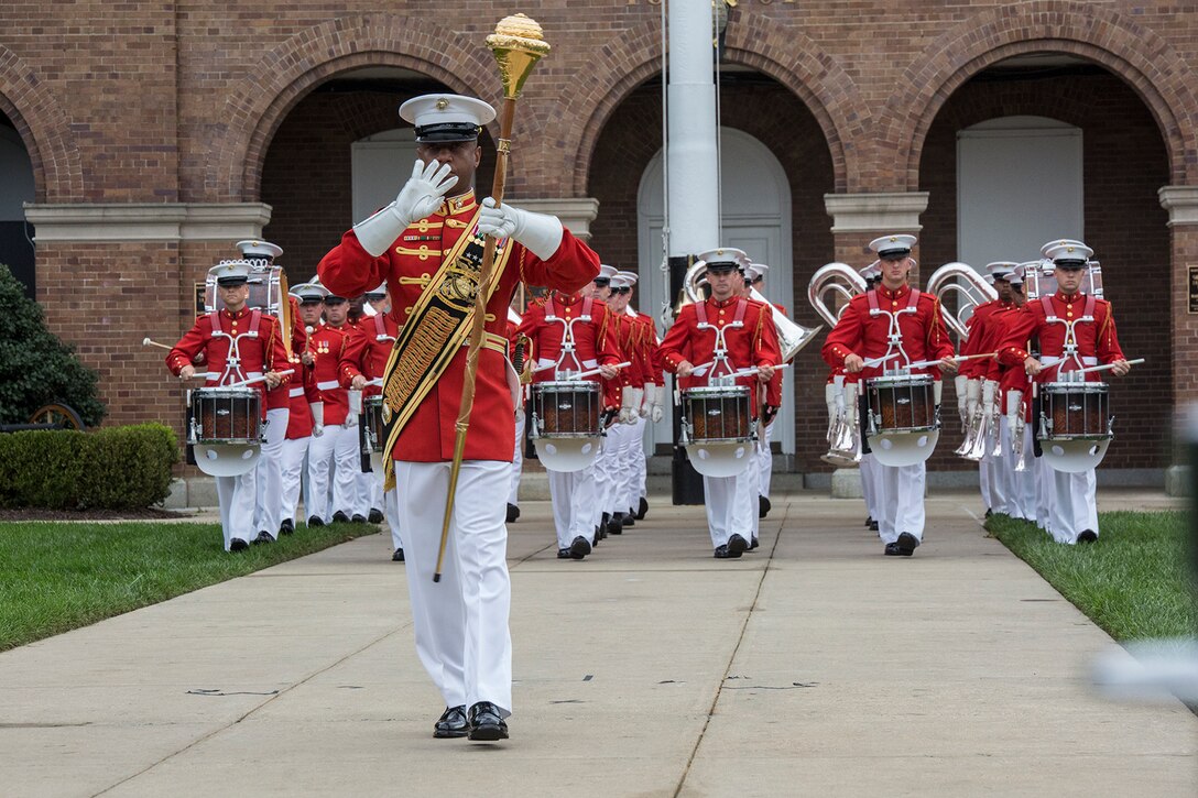 Master Gunnery Sgt. Kevin Buckles, drum major, “The Commandant’s Own” U.S. Marine Drum & Bugle Corps, marches the D&B down center walk during a Beirut Memorial Parade at Marine Barracks Washington D.C., Oct. 23, 2017. The ceremony was conducted to honor the 34th anniversary of the attack on the U.S. and French Barracks in Beirut and remember the fallen service members, and survivors and their families. (Official Marine Corps photo by Cpl. Robert Knapp/Released)