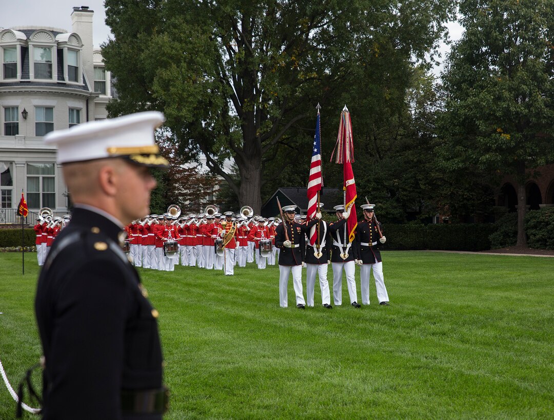 The U.S. Marine Corps Color Guard marches across the parade deck during a Beirut Memorial Parade at Marine Barracks Washington D.C., Oct. 23, 2017. The ceremony was conducted to honor the 34th anniversary of the attack on the U.S. and French Barracks in Beirut and remember the fallen service members, and survivors and their families. (Official Marine Corps photo by Cpl. Robert Knapp/Released)